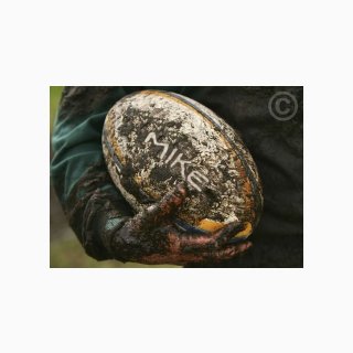 Muddy Rugby Ball